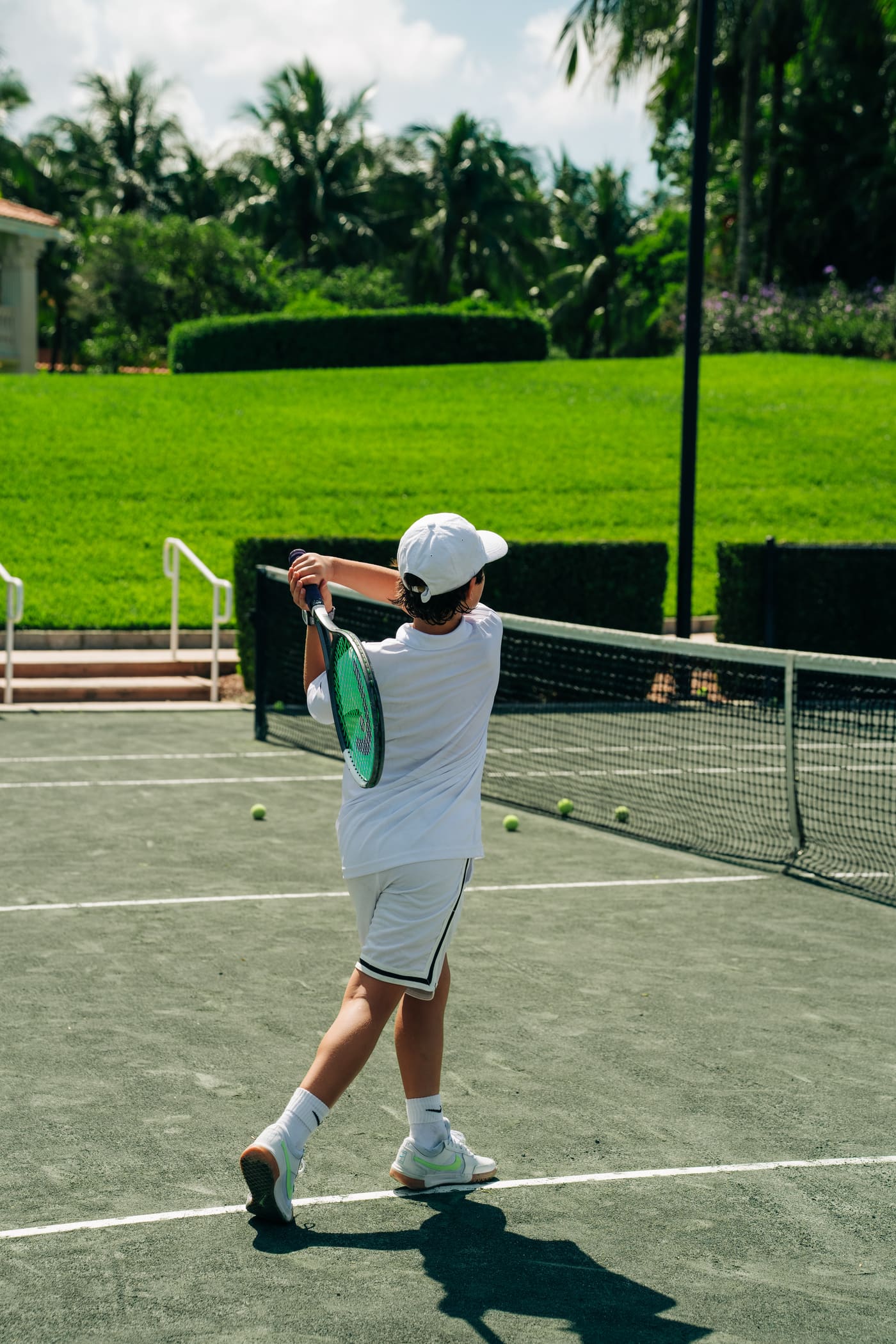 Player serving toward the net