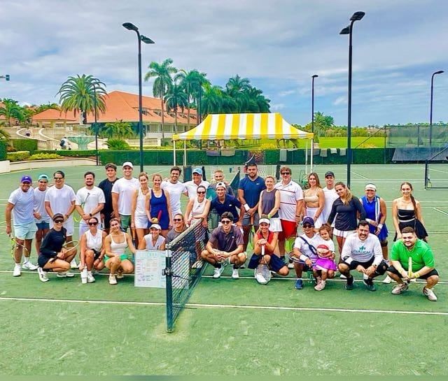 Full academy group on court at Italian Tennis Academy
